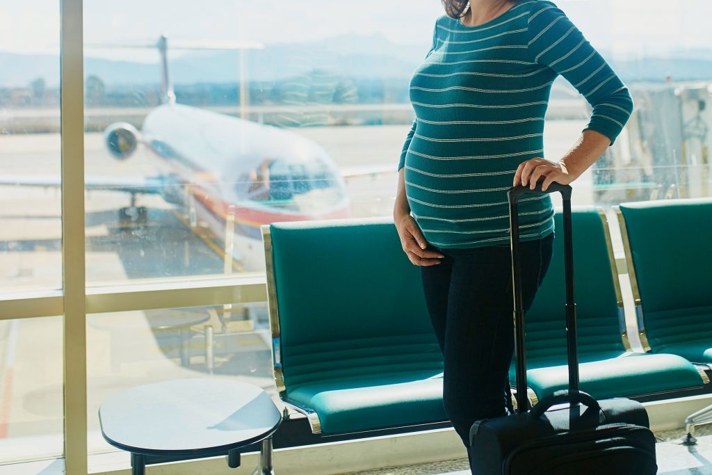 Pregnant woman traveling